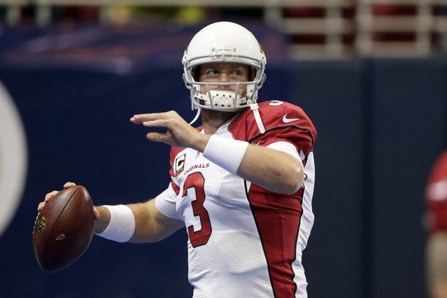 Arizona Cardinals quarterback Carson Palmer warms up before the start of an NFL football game between the St. Louis Rams and the Arizona Cardinals on Sunday, Dec. 6, 2015, in St. Louis. (AP Photo/Tom Gannam)
