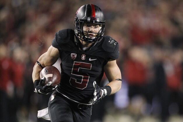 Dec 5, 2015; Santa Clara, CA, USA; Stanford Cardinal running back Christian McCaffrey (5) scores a 28 yard reception and touchdown against the Southern California Trojans in the fourth quarter of the Pac-12 Conference football championship game at Levi's Stadium.  The Cardinal defeated the Trojans 41-22. Mandatory Credit: Cary Edmondson-USA TODAY Sports