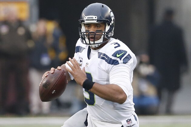 Seattle Seahawks quarterback Russell Wilson (3) scrambles against the Minnesota Vikings in the second half of an NFL football game Sunday, Dec. 6, 2015 in Minneapolis. (AP Photo/Ann Heisenfelt)