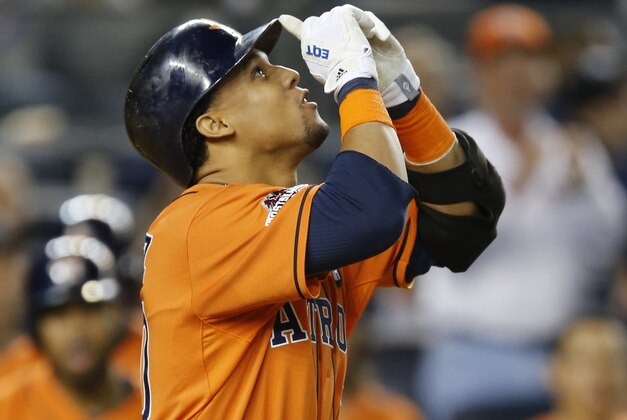 Houston Astros Carlos Gomez reacts after hitting a solo-home run during the fourth inning of the American League wild card baseball game against the New York Yankees at Yankee Stadium in New York, Tuesday, Oct. 6, 2015. (AP Photo/Kathy Willens)