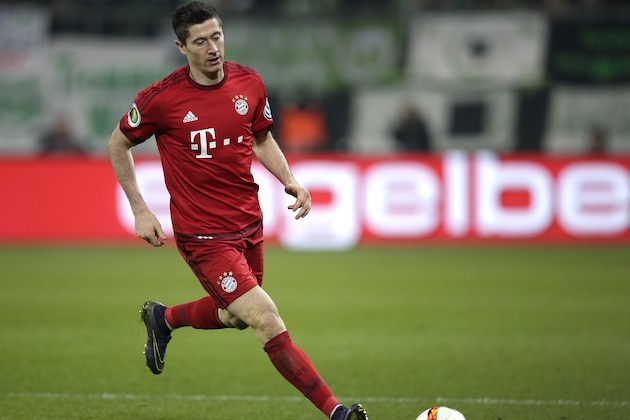 Bayern's Robert Lewandowski plays the ball during the German soccer cup 2nd round match between VfL Wolfsburg and FC Bayern Munich in Wolfsburg, Germany, Tuesday, Oct. 27, 2015. (AP Photo/Michael Sohn)