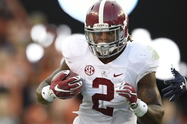 Nov 28, 2015; Auburn, AL, USA; Alabama Crimson Tide running back Derrick Henry (2) carries the ball against the Auburn Tigers at Jordan Hare Stadium. Mandatory Credit: RVR Photos-USA TODAY Sports
