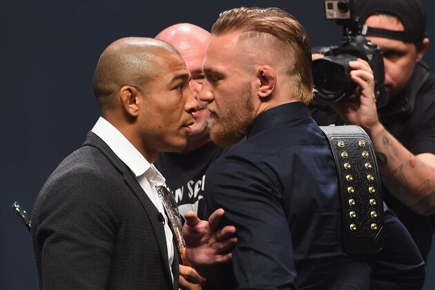 LAS VEGAS, NV - SEPTEMBER 04:  (L-R) UFC featherweight champion Jose Aldo and featherweight interim champion Conor McGregor face off during the UFC's Go Big launch event inside MGM Grand Garden Arena on September 4, 2015 in Las Vegas, Nevada.  (Photo by Josh Hedges/Zuffa LLC/Zuffa LLC via Getty Images)