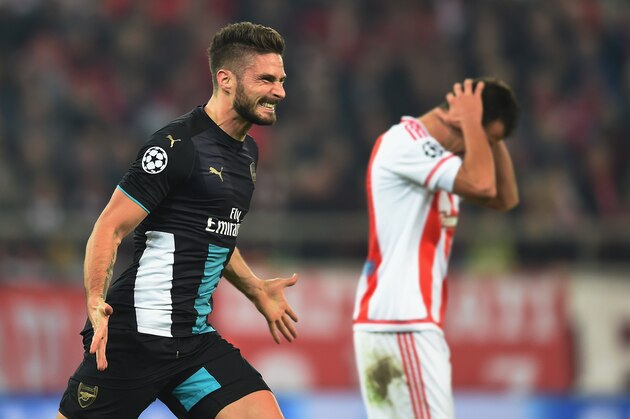PIRAEUS, GREECE - DECEMBER 09:  Olivier Giroud of Arsenal celebrates scoring the third goal and his hat-trick for Arsenal during the UEFA Champions League Group F match between Olympiacos FC and Arsenal FC at Karaiskakis Stadium on December 9, 2015 in Piraeus, Greece.  (Photo by Michael Regan/Getty Images)