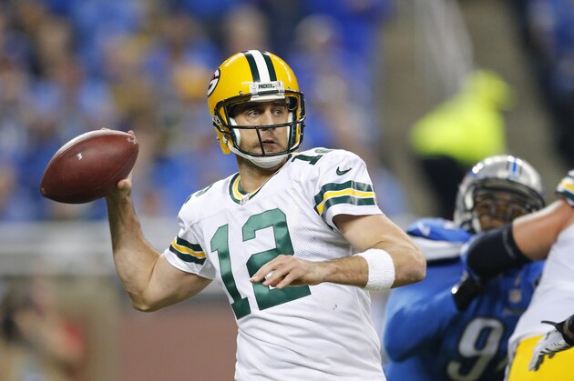 Green Bay Packers quarterback Aaron Rodgers (12) throws during the second half of an NFL football game against the Detroit Lions, Thursday, Dec. 3, 2015, in Detroit. (AP Photo/Rick Osentoski)