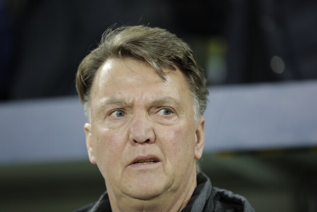 Manchester United's manager Louis van Gaal arrives for the Champions League group B soccer match between VfL Wolfsburg and Manchester United in Wolfsburg, Germany, Tuesday, Dec. 8, 2015. (AP Photo/Markus Schreiber)