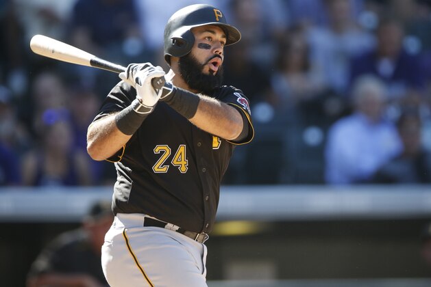 Pittsburgh Pirates first baseman Pedro Alvarez (24) bats against the Colorado Rockies in the third foufifth sixth seventh eighth ninth inning of a baseball game Thursday, Sept. 24, 2015, in Denver. Pittsburgh won 5-4. (AP Photo/David Zalubowski)