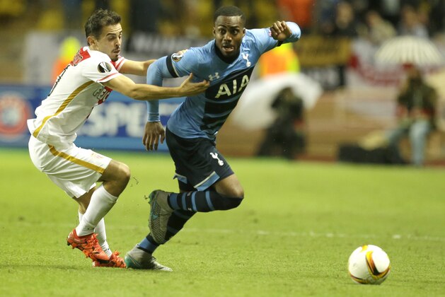 Monaco's Bernardo Silva, left, challenges for the ball with Tottenham's Danny Roseduring their Europa League group J soccer match in Monaco stadium, Monaco, Thursday, Oct. 1, 2015. (AP Photo/Lionel Cironneau)