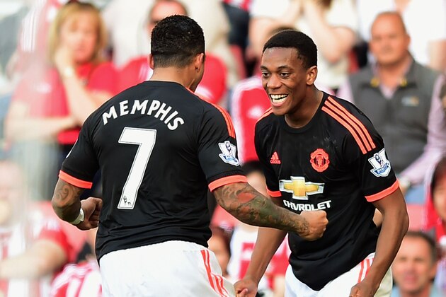 SOUTHAMPTON, ENGLAND - SEPTEMBER 20:  Anthony Martial of Manchester United (9) celebrates with Memphis Depay as he scores his and his team's second goal during the Barclays Premier League match between Southampton and Manchester United at St Mary's Stadium on September 20, 2015 in Southampton, United Kingdom.  (Photo by Alex Broadway/Getty Images)