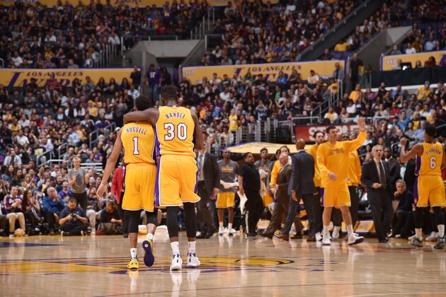 LOS ANGELES, CA - NOVEMBER 20:  Julius Randle #30 of the Los Angeles Lakers and D'Angelo Russell #1 of the Los Angeles Lakers talk during the game against the Toronto Raptors on November 20, 2015 at STAPLES Center in Los Angeles, California. NOTE TO USER: User expressly acknowledges and agrees that, by downloading and/or using this Photograph, user is consenting to the terms and conditions of the Getty Images License Agreement. Mandatory Copyright Notice: Copyright 2015 NBAE (Photo by Jon SooHoo/NBAE via Getty Images)