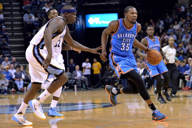 Oklahoma City Thunder forward Kevin Durant (35) drives against Memphis Grizzlies forward Zach Randolph, left, in the first half of an NBA basketball game Tuesday, Dec. 8, 2015, in Memphis, Tenn. (AP Photo/Brandon Dill)