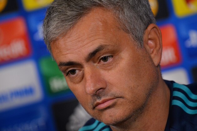 Chelsea's Portuguese manager Jose Mourinho gives a press conference on the eve of a UEFA Champions League, group G football match against Porto at Chelsea's training ground in Cobham, south west London on December 8, 2015. 
AFP PHOTO / GLYN KIRK / AFP / GLYN KIRK        (Photo credit should read GLYN KIRK/AFP/Getty Images)