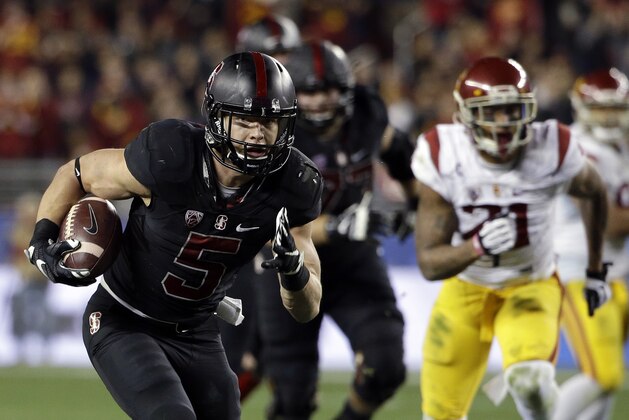 Stanford running back Christian McCaffrey (5) heads for the end zone for a touchdown on a 28-yard pass during the second half of a Pac-12 Conference championship NCAA college football game Saturday, Dec. 5, 2015, in Santa Clara, Calif. Stanford won 41-22. (AP Photo/Marcio Jose Sanchez)