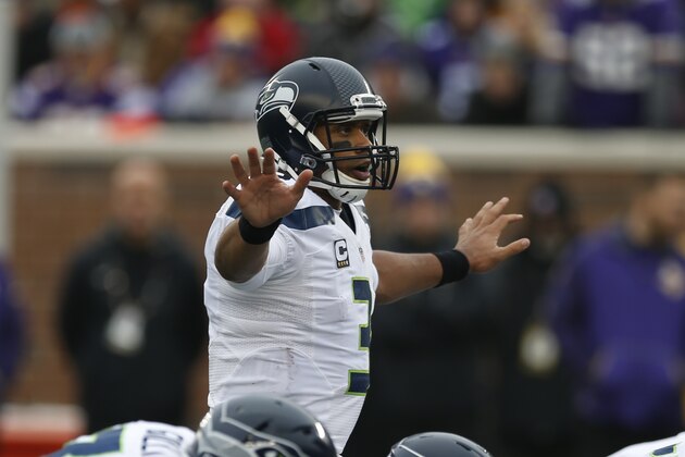 Seattle Seahawks quarterback Russell Wilson (3) calls an audible against the Minnesota Vikings in the second half of an NFL football game Sunday, Dec. 6, 2015 in Minneapolis. (AP Photo/Jim Mone)