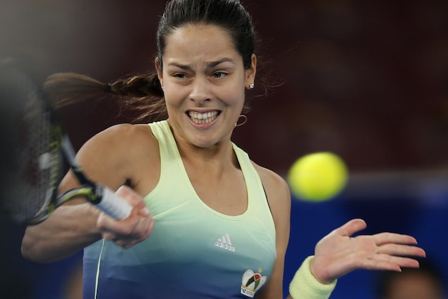 UAE Royal's Ana Ivanovic plays against Japan Warriors' Kurumi Nara in the women's singles event of the International Premier Tennis League in New Delhi, India, Thursday, Dec. 10, 2015. (AP Photo/Tsering Topgyal)