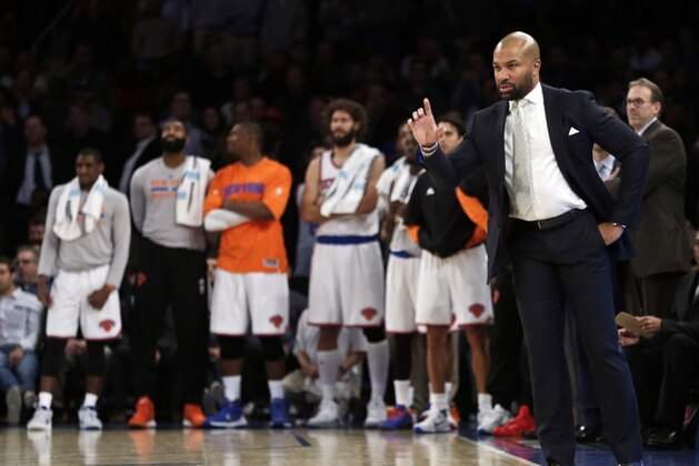 New York Knicks head coach Derek Fisher gestures to his team during the second half of an NBA basketball game against the Dallas Mavericks Monday, Dec. 7, 2015, in New York. The Mavericks won 104-97. (AP Photo/Frank Franklin II)