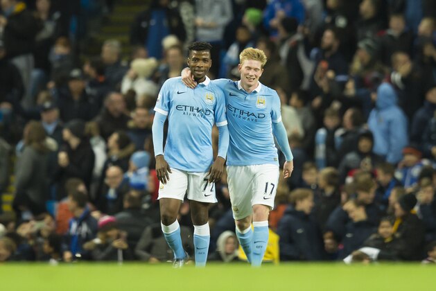 Manchester City's Kevin De Bruyne, right, celebrates with teammate Kelechi Iheancho after scoring against Hull City's during the English League Cup soccer match between Manchester City and Hull City at the Etihad Stadium, Manchester, England, Tuesday, Dec. 1, 2015. (AP Photo/Jon Super)