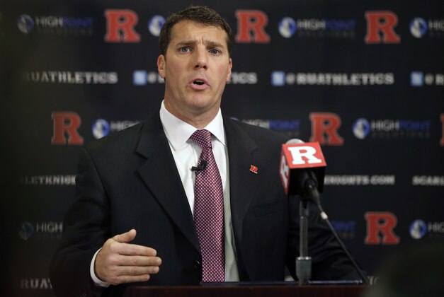 Chris Ash addresses a gathering after he was announced new NCAA college football coach for Rutgers,  Monday, Dec. 7, 2015, in Piscataway, N.J. Athletic director Julie Hermann and football coach Kyle Flood were fired Sunday, Nov. 29, 2015. (AP Photo/Mel Evans)