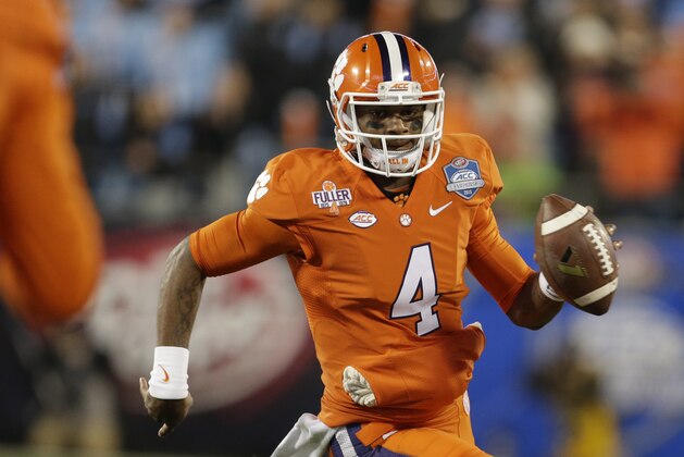 Clemson quarterback Deshaun Watson (4) runs against North Carolina during the first half of the Atlantic Coast Conference championship NCAA college football game in Charlotte, N.C., Saturday, Dec. 5, 2015. (AP Photo/Bob Leverone)