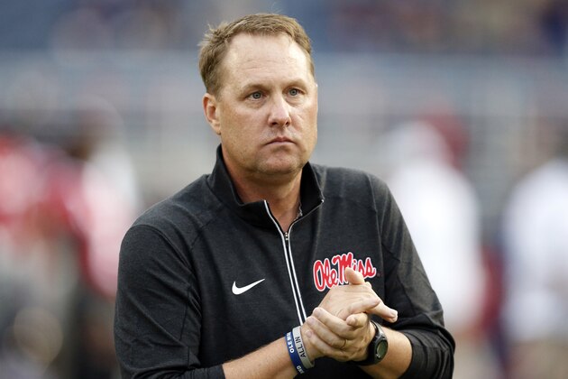 Mississippi football coach Hugh Freeze watches his team warmup prior to their NCAA college football game against Texas A&M in Oxford, Miss., Saturday, Oct. 24, 2015. (AP Photo/Rogelio V. Solis)