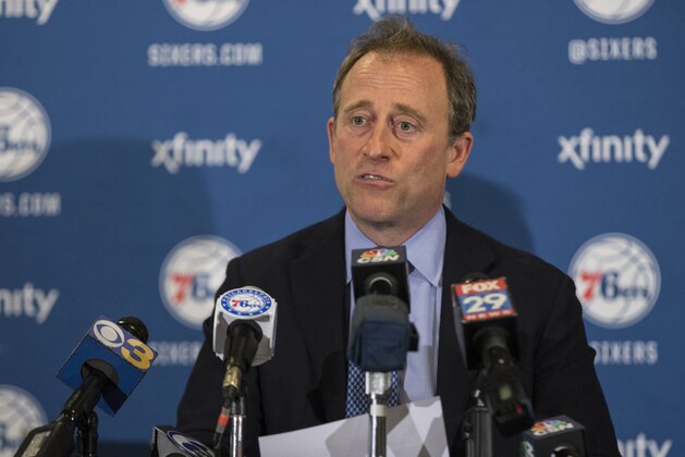 Philadelphia 76ers co-Managing Owner Josh Harris holds a news conference to announce that Naismith Memorial Basketball Hall of Fame member and Chairman of the Board of Directors for USA Basketball Jerry Colangelo will be joining the Philadelphia 76ers as the Special Advisor to the Managing General Partner and Chairman of Basketball Operations prior to the first half of an NBA basketball game against the San Antonio Spurs, Monday, Dec. 7, 2015, in Philadelphia. (AP Photo/Chris Szagola)