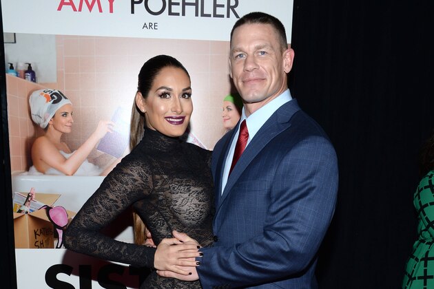 Nikki Bella, left, and John Cena attend the premiere of
