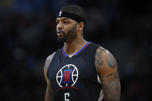 Los Angeles Clippers forward Josh Smith (5) faces the Denver Nuggets in the first half of an NBA basketball game Tuesday, Nov. 24, 2015, in Denver. (AP Photo/David Zalubowski)