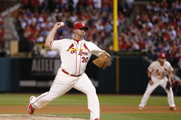 St. Louis Cardinals' Jonathan Broxton (30) throws during the ninth inning of Game 2 in baseball's National League Division Series against the Chicago Cubs, Saturday, Oct. 10, 2015, in St. Louis. (AP Photo/Charles Rex Arbogast)