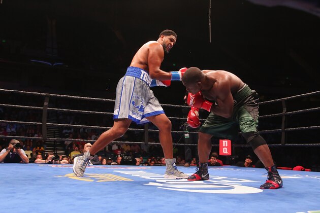 BIRMINGHAM, AL - SEPTEMBER 26:  Dominic Breazeale and Fred Kassi fight at Legacy Arena at the BJCC on September 26, 2015 in Birmingham, Alabama.  (Photo by David A. Smith/Getty Images)