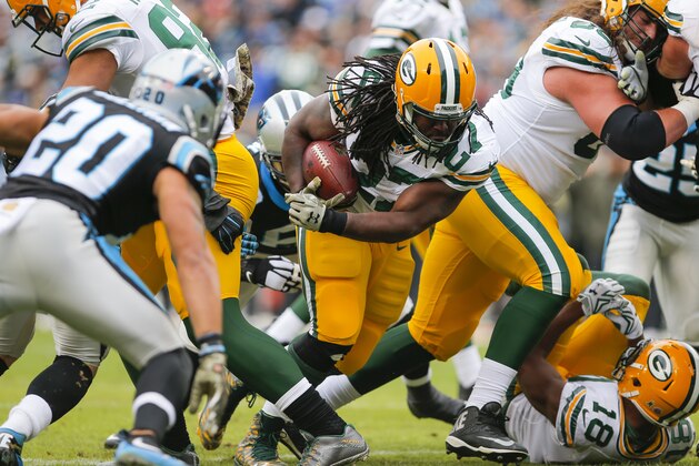 Green Bay Packers running back Eddie Lacy (27) runs the ball against the Carolina Panthers during an NFL game at Bank of America Stadium in Charlotte, N.C. on Sunday, Nov. 8, 2015. (Chris Keane/AP Images for Panini)