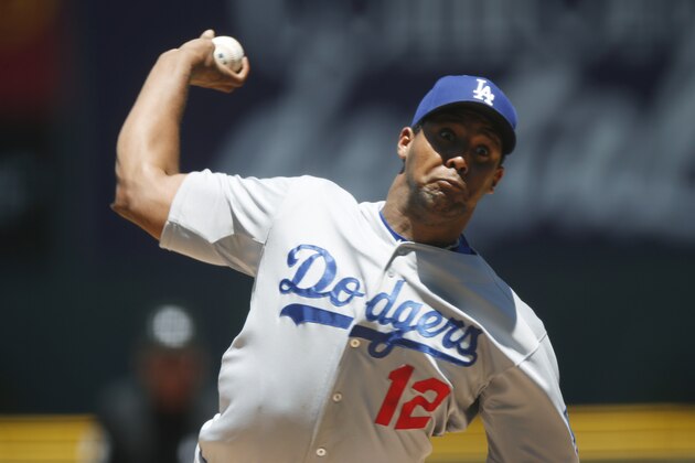 Los Angeles Dodgers starting pitcher Juan Nicasio works against the Colorado Rockies during the first inning of game one in a baseball doubleheader, Tuesday, June 2, 2015, in Denver. (AP Photo/David Zalubowski) Los Angeles Dodgers starting pitcher Juan Nicasio works against the Colorado Rockies during the first inning of game one in a baseball doubleheader, Tuesday, June 2, 2015, in Denver. (AP Photo/David Zalubowski)