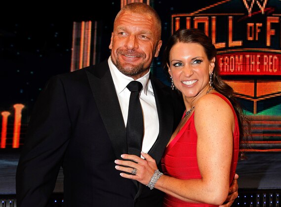 Paul Levesque aka Triple H and Stephanie McMahon are seen at the WWE Hall of Fame Induction at the Smoothie King Center in New Orleans on Saturday, April 5, 2014. (Jonathan Bachman/AP Images for WWE)