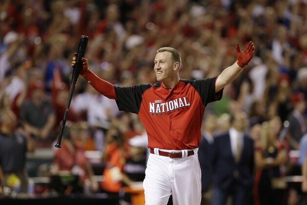 National League's Todd Frazier, of the Cincinnati Reds, reacts after winning the MLB All-Star baseball Home Run Derby, Monday, July 13, 2015, in Cincinnati. (AP Photo/Jeff Roberson)
