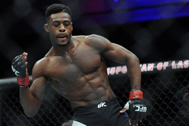 December 10, 2015; Las Vegas, NV, USA; Aljamain Sterling celebrates his victory by chokehold submission against Johnny Eduardo during UFC Fight Night at The Chelsea at the Cosmopolitan. Mandatory Credit: Gary A. Vasquez-USA TODAY Sports