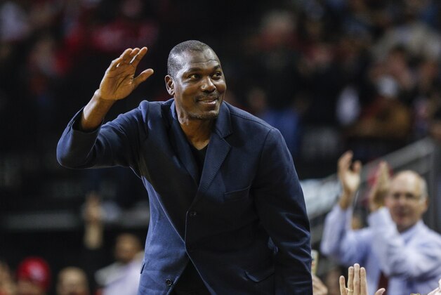 Jan 28, 2015; Houston, TX, USA; NBA former player Hakeem Olajuwon waves to the crowd during the game between the Houston Rockets and the Dallas Mavericks at Toyota Center. Mandatory Credit: Troy Taormina-USA TODAY Sports