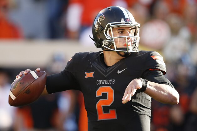 Oklahoma State quarterback Mason Rudolph (2) is pictured during an NCAA college football game between TCU and Oklahoma State in Stillwater, Okla., Saturday, Nov. 7, 2015. Oklahoma State won 49-29. (AP Photo/Sue Ogrocki)
