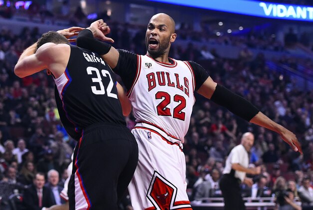 Dec 10, 2015; Chicago, IL, USA;  Chicago Bulls forward Taj Gibson (22) and Los Angeles Clippers forward Blake Griffin (32) attempt to get a rebound during the first quarter at the United Center. Mandatory Credit: Mike DiNovo-USA TODAY Sports