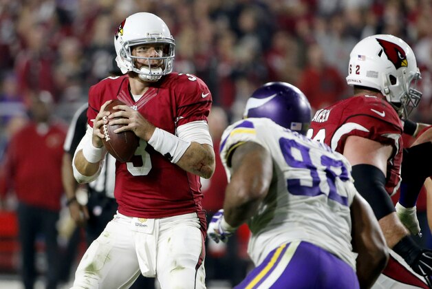 Arizona Cardinals quarterback Carson Palmer (3) looks to pass against the Minnesota Vikings during the second half of an NFL football game, Thursday, Dec. 10, 2015, in Glendale, Ariz. (AP Photo/Ross D. Franklin)