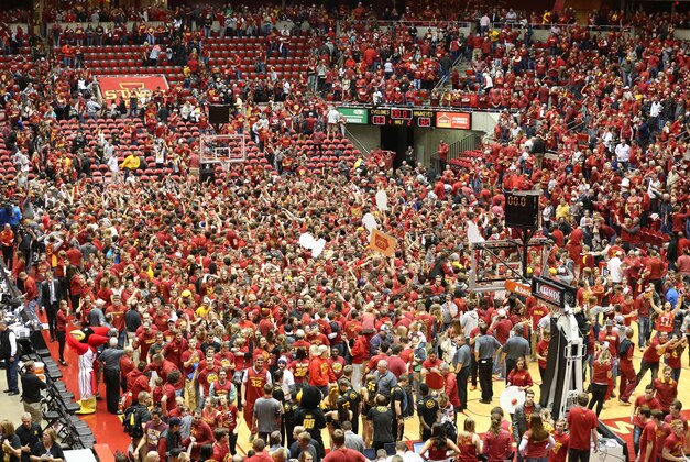Dec 10, 2015; Ames, IA, USA; Iowa State Cyclones students rush the court after beating the Iowa Hawkeyes at James H. Hilton Coliseum. The Cyclones beat the Hawkeyes 83-82.  Mandatory Credit: Reese Strickland-USA TODAY Sports