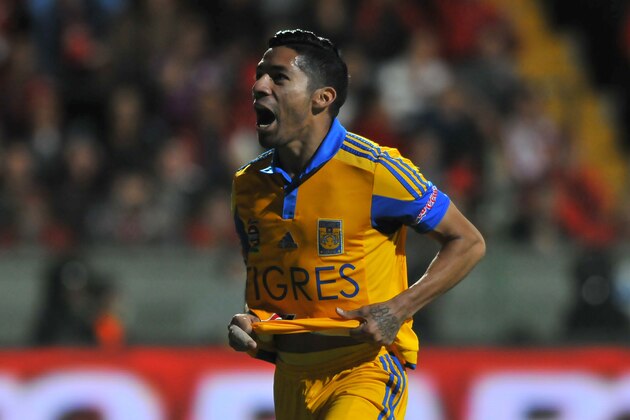 Javier Aquino of Tigres celebrates his goal against Toluca during the semifinal match of Mexican Apertura Tournament, at the Nemesio Diez stadium, on December 06, 2015, in Toluca, Mexico. AFP PHOTO/MARIA CALLS / AFP / MARIA CALLS        (Photo credit should read MARIA CALLS/AFP/Getty Images)