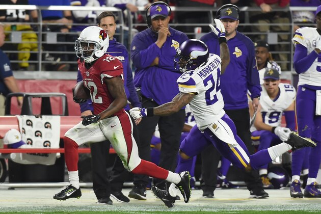 GLENDALE, AZ - DECEMBER 10:  Wide receiver John Brown #12 of the Arizona Cardinals runs in a 65 yard touchdown against cornerback Captain Munnerlyn #24 of the Minnesota Vikings during the first quarter of the NFL game at University of Phoenix Stadium on December 10, 2015 in Glendale, Arizona.  (Photo by Norm Hall/Getty Images)