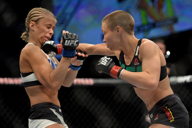 LAS VEGAS, NEVADA - DECEMBER 10:  (R) Rose Namajunas punches Paige VanZant in their women's strawweight bout during the UFC Fight Night event at The Chelsea at the Cosmopolitan of Las Vegas on December 10, 2015 in Las Vegas, Nevada.  (Photo by Brandon Magnus/Zuffa LLC/Zuffa LLC via Getty Images)