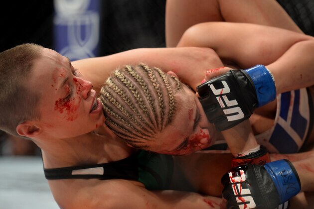 LAS VEGAS, NEVADA - DECEMBER 10:  (L) Rose Namajunas attempts a submission on Paige VanZant in their women's strawweight bout during the UFC Fight Night event at The Chelsea at the Cosmopolitan of Las Vegas on December 10, 2015 in Las Vegas, Nevada.  (Photo by Brandon Magnus/Zuffa LLC/Zuffa LLC via Getty Images)