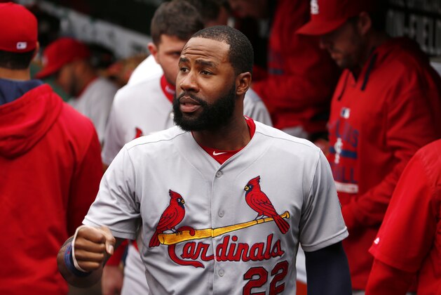 St. Louis Cardinals' Jason Heyward (22) walks through the dugout before a baseball game against the Pittsburgh Pirates in Pittsburgh, Wednesday, Sept. 30, 2015. (AP Photo/Gene J. Puskar)