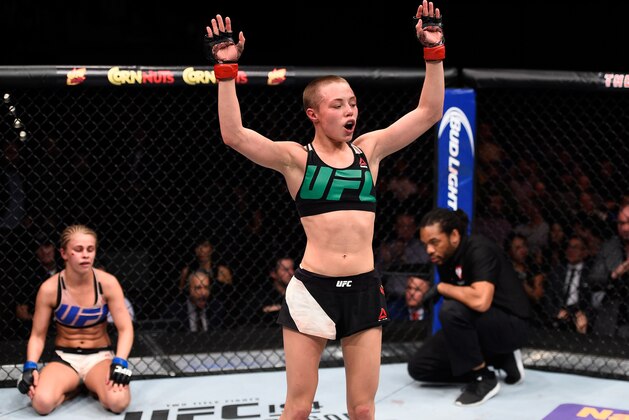 LAS VEGAS, NEVADA - DECEMBER 10:  (R-L) Rose Namajunas celebrates her submission victory over Paige VanZant in their women's strawweight bout during the UFC Fight Night event at The Chelsea at the Cosmopolitan of Las Vegas on December 10, 2015 in Las Vegas, Nevada.  (Photo by Jeff Bottari/Zuffa LLC/Zuffa LLC via Getty Images)