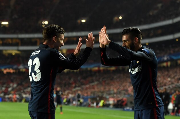 Atletico Madrid's Argentinian forward Luciano Vietto (L) celebrates with a teammate after scoring a goal during the UEFA Champions League Group C football match SL Benfica vs Club Atletico de Madrid at the Luz stadium in Lisbon on December 8, 2015.   AFP PHOTO/ FRANCISCO LEONG / AFP / FRANCISCO LEONG        (Photo credit should read FRANCISCO LEONG/AFP/Getty Images)