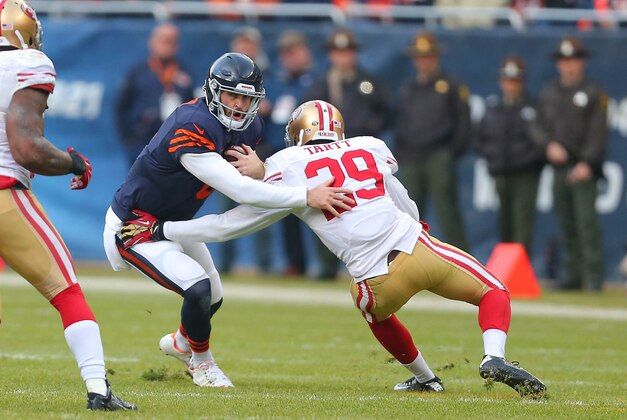 Dec 6, 2015; Chicago, IL, USA; Chicago Bears quarterback Jay Cutler (6) is tackled by San Francisco 49ers strong safety Jaquiski Tartt (29) during the second half at Soldier Field. San Francisco won 26-20 in overtime. Mandatory Credit: Dennis Wierzbicki-USA TODAY Sports