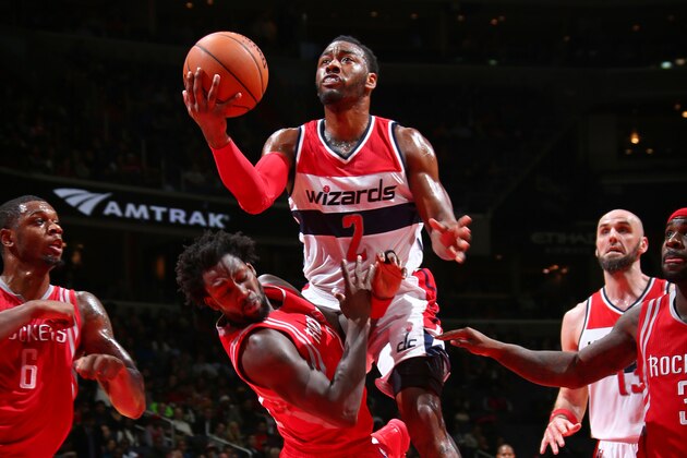 WASHINGTON, DC -  DECEMBER 9:  John Wall #2 of the Washington Wizards handles the ball against the Houston Rockets on December 9, 2015 at Verizon Center in Washington, DC. NOTE TO USER: User expressly acknowledges and agrees that, by downloading and or using this Photograph, user is consenting to the terms and conditions of the Getty Images License Agreement. Mandatory Copyright Notice: Copyright 2015 NBAE (Photo by Ned Dishman/NBAE via Getty Images)