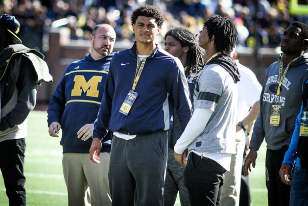 Tampa, Florida, 4-star TE Jacob Mathis (center) took his first official visit to Michigan in October. Mathis said Alabama, Ole Miss and Florida are in great positions to get official visits in January.