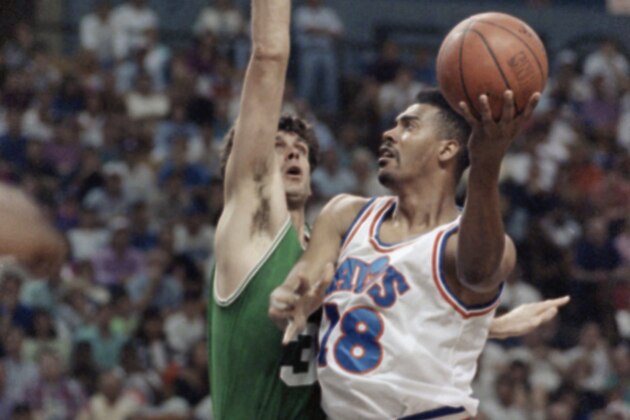 Cleveland Cavaliers forward John Williams (18) goes up for a shot against Kevin McHale of the Boston Celtics during a 122-104 NBA Eastern Conference semifinal win by Cleveland, Sunday, May 18, 1992, Richfield, Ohio. The Cavaliers advanced to the conference finals for the first time in team history. (AP Photo/Mark Duncan)